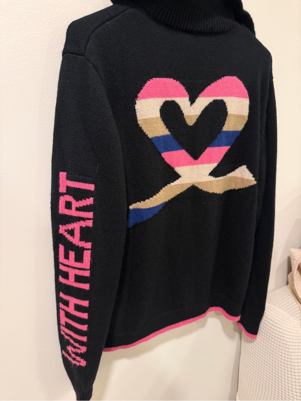 Daily Sports Black Turtleneck Sweater with Multicolor Heart and Pink Sleeve Text